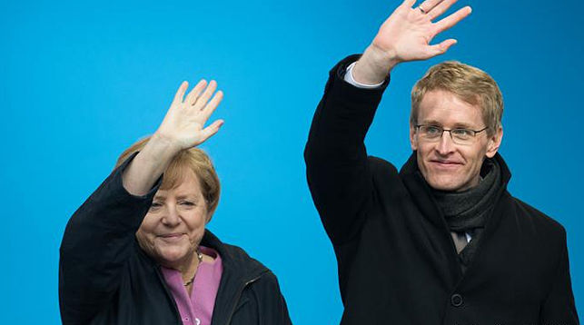 На фото: канцлер ФРГ Ангела Меркель и главный кандидат ХДС на земельных выборах Даниэль Гюнтер