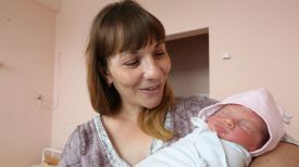 Марина Бондаренко с новорожденным ребенком