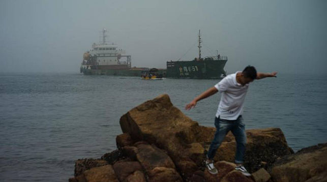 Сухогруз в китайском порту. Фото из архива EPA - EFE
