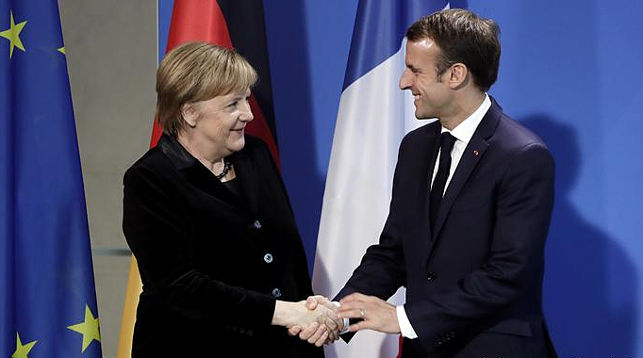 Ангела Меркель и Эмманюэль Макрон. Фото AP