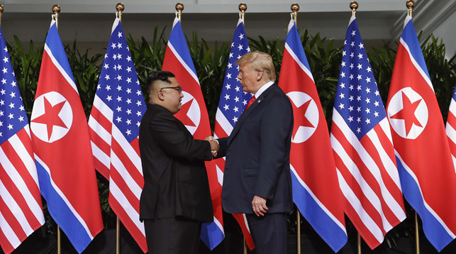 Ким Чен Ын и Дональд Трамп. Фото   AP  