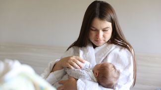 Виктория Лукьянович с новорожденным