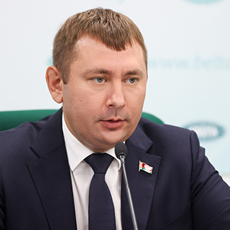 Александр Цай