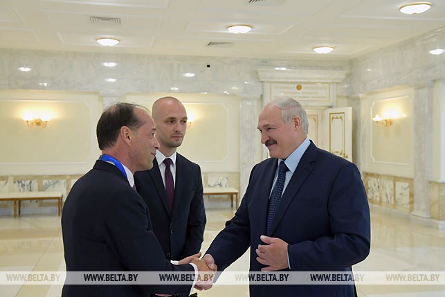 Президент Беларуси Александр Лукашенко и государственный министр по торговой политике Министерства внешней торговли Великобритании Джордж Холлингбери