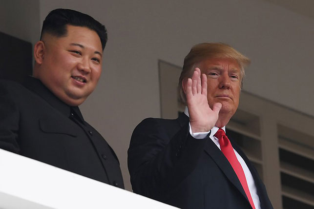 Ким Чен Ын и Дональд Трамп. Фото Saul Loeb-AFP/Getty Images