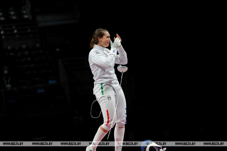 Команда Италии радуется завоеванной бронзовой медали Команда Италии радуется завоеванной бронзовой медали