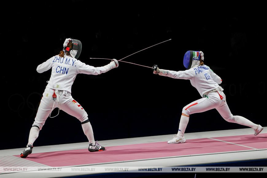 Во время командных соревнований Китай-Италия Во время командных соревнований Китай-Италия